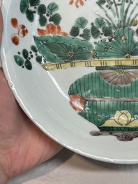 Two Chinese famille verte 'flower basket' dishes and a plate, Kangxi