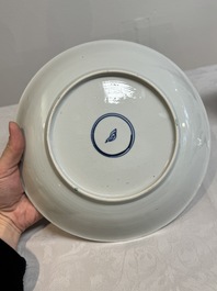 Two Chinese famille verte 'flower basket' dishes and a plate, Kangxi
