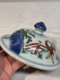 A pair of Chinese wucai vases and covers with court ladies and playing boys, Transitional period