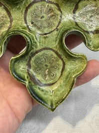 A Chinese green-glazed marbled dish, probably Tang