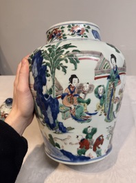 A pair of Chinese wucai vases and covers with court ladies and playing boys, Transitional period