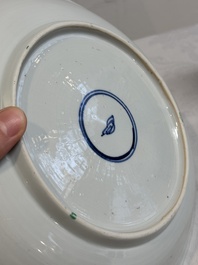 Two Chinese famille verte 'flower basket' dishes and a plate, Kangxi