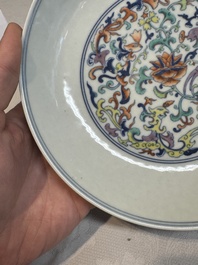 A Chinese doucai 'phoenix and lotus scroll' plate, Qianlong mark and of the period