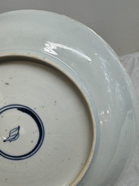 Two Chinese famille verte 'flower basket' dishes and a plate, Kangxi