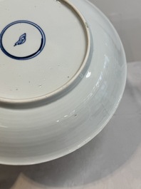 Two Chinese famille verte 'flower basket' dishes and a plate, Kangxi