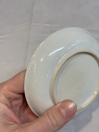 Two Chinese gilt-decorated grisaille 'European subject' cups and saucers, Qianlong