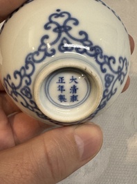 A Chinese blue and white cup with floral design, Yongzheng mark, 20th C.