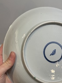 Two Chinese famille verte 'flower basket' dishes and a plate, Kangxi