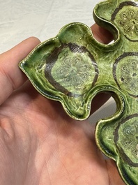 A Chinese green-glazed marbled dish, probably Tang