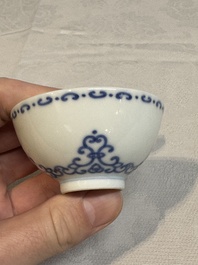A Chinese blue and white cup with floral design, Yongzheng mark, 20th C.