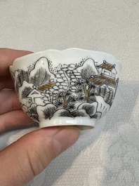 A set of four Chinese gilt-decorated grisaille 'landscape' cups and saucers, Yongzheng/Qianlong