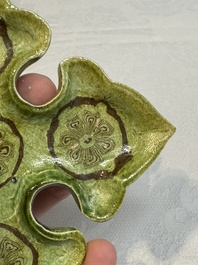 A Chinese green-glazed marbled dish, probably Tang