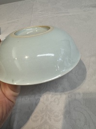 A Chinese monochrome 'anhua' 'dragon' bowl and a blue and white 'dragon' saucer, 18/19th C.