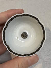 A set of four Chinese gilt-decorated grisaille 'landscape' cups and saucers, Yongzheng/Qianlong