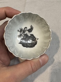 Two Chinese gilt-decorated grisaille 'European subject' cups and saucers, Qianlong