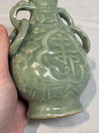 A Chinese Longquan celadon 'shou' vase with handles, Ming