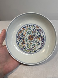 A Chinese doucai 'phoenix and lotus scroll' plate, Qianlong mark and of the period