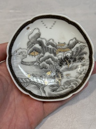 A set of four Chinese gilt-decorated grisaille 'landscape' cups and saucers, Yongzheng/Qianlong