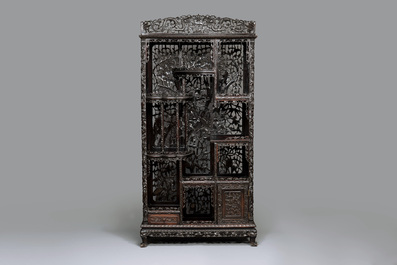 A richly carved Chinese hongmu display cabinet, Canton, 19th C.