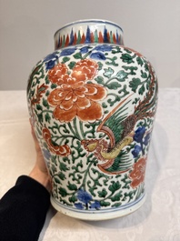 A Chinese wucai 'phoenixes and peonies scroll' vase, Transitional period