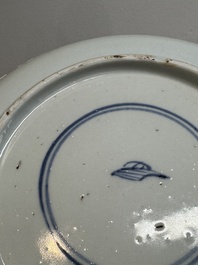Two Chinese famille verte 'flower basket' dishes and a plate, Kangxi