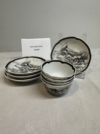A set of four Chinese gilt-decorated grisaille 'landscape' cups and saucers, Yongzheng/Qianlong