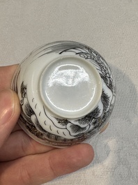 A set of four Chinese gilt-decorated grisaille 'landscape' cups and saucers, Yongzheng/Qianlong