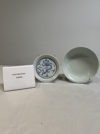A Chinese monochrome 'anhua' 'dragon' bowl and a blue and white 'dragon' saucer, 18/19th C.