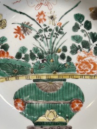Two Chinese famille verte 'flower basket' dishes and a plate, Kangxi