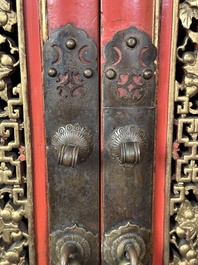 A large and fine Chinese gilt-red-lacquered cabinet with figures and antiquities, 19th C.