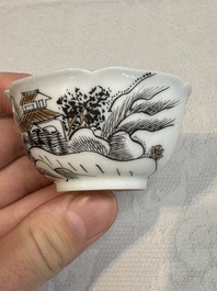 A set of four Chinese gilt-decorated grisaille 'landscape' cups and saucers, Yongzheng/Qianlong