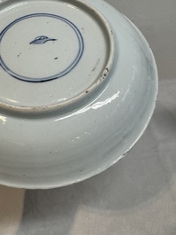 Two Chinese famille verte 'flower basket' dishes and a plate, Kangxi