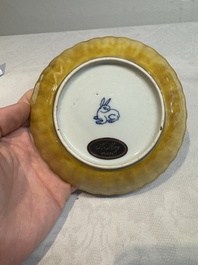A rare Chinese blue and white yellow-glazed border chrysanthemum-shaped plate with figural design, hare mark, Jiajing
