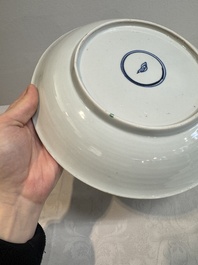 Two Chinese famille verte 'flower basket' dishes and a plate, Kangxi