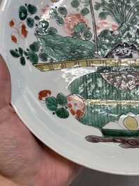 Two Chinese famille verte 'flower basket' dishes and a plate, Kangxi