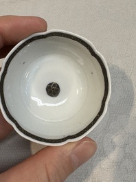 A set of four Chinese gilt-decorated grisaille 'landscape' cups and saucers, Yongzheng/Qianlong