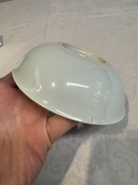 A Chinese monochrome 'anhua' 'dragon' bowl and a blue and white 'dragon' saucer, 18/19th C.