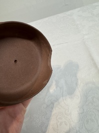 A large Chinese Yixing stoneware teapot and cover, Kangxi