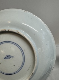 Two Chinese famille verte 'flower basket' dishes and a plate, Kangxi