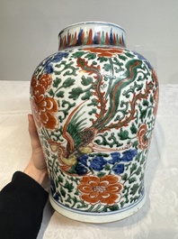 A Chinese wucai 'phoenixes and peonies scroll' vase, Transitional period
