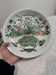 Two Chinese famille verte 'flower basket' dishes and a plate, Kangxi