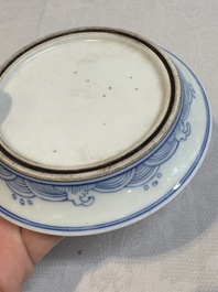 A Chinese monochrome 'anhua' 'dragon' bowl and a blue and white 'dragon' saucer, 18/19th C.