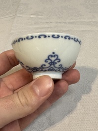 A Chinese blue and white cup with floral design, Yongzheng mark, 20th C.