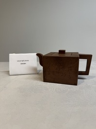 A Chinese Yixing stoneware teapot and cover, signed Hu Yaoting 胡耀庭, dated 1912