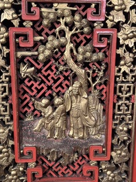 A large and fine Chinese gilt-red-lacquered cabinet with figures and antiquities, 19th C.