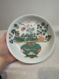 Two Chinese famille verte 'flower basket' dishes and a plate, Kangxi