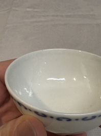 A Chinese blue and white cup with floral design, Yongzheng mark, 20th C.