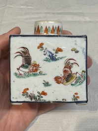 A pair of Chinese famille verte rectangular tea caddies and covers with fighting roosters, Kangxi