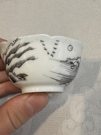 A set of four Chinese gilt-decorated grisaille 'landscape' cups and saucers, Yongzheng/Qianlong