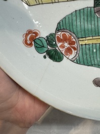 Two Chinese famille verte 'flower basket' dishes and a plate, Kangxi